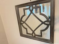 Front view showing entire mirror, frame, and overlay