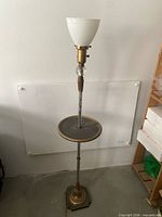 Full view of floor lamp showing shade, column, tray table, base