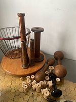 Overall lot showing basket, spools, dumbbells, darning tools
