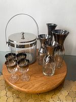 Full set showing ice bucket, four decanters, four glasses