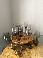 Group shot showing all 18 smokey gray glass pieces