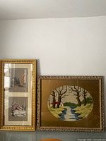 Both framed embroideries side by side for scale