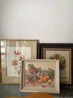 Front view showing all three framed artworks