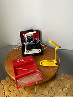 Both reading lights with cases on table