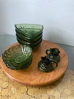 All pieces grouped: bowls stacked, candle holders front