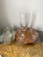 All items grouped: stacked plates, vase, four dessert coupes each on saucer