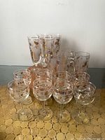 Full set of 16 glasses showing designs and types