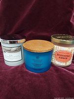 Group view of three scented candles