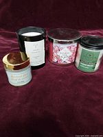 Four candles grouped to show variety and scale