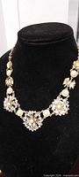 Necklace front view on bust showing design and components