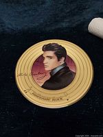Front of plate showing Elvis portrait, gold record-style rim