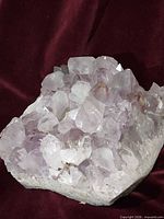 Front angle of amethyst cluster showing crystal points