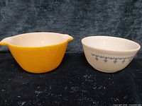Both bowls side by side showing size and color difference