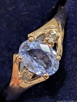 Top view of ring showing sapphire and diamond accents