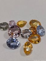 Group of assorted fancy color faceted sapphires
