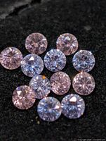 Close-up of pastel pink and lavender cubic zirconia stones