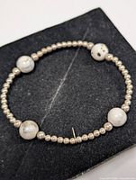 Top view of bracelet showing arrangement of stone and metal beads