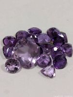 Grouped view of all loose faceted amethyst gemstones