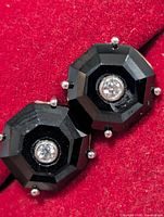 Front view showing octagonal black onyx stones with clear centres