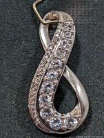 Front close-up of pendant showing stone setting