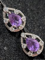 front view of both earrings showing amethyst and CZ
