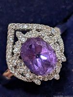 Front view of ring showing amethyst and CZ halo