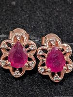 Front view showing rubies and clear stones