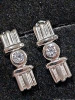 front view of both earrings showing stones and design