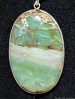 front view of oval chrysoprase silver pendant