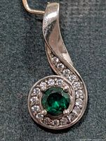 Front view of pendant showing green chrome diopside and CZ halo