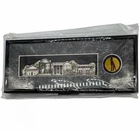 Front view of sealed framed print showing artwork and emblem