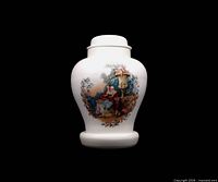 Full view of urn with lid showing scenic decoration