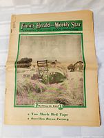 Front page showing title, date and main photo