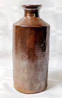 Full view of brown stoneware bottle