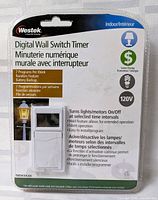Front of sealed Westek digital wall switch timer package