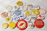 Full group shot of all vintage pinback buttons