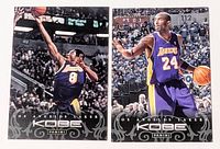 Front view of both Kobe Bryant Panini cards