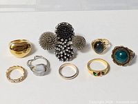 All eight rings arranged on surface