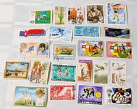 Full layout of all 19 stamps showing variety of countries and themes