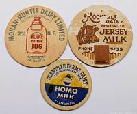 Front view of all three milk caps showing graphics and text