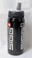 Front view of black SIGG water bottle with grey cap and spout