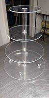 Full view of assembled four-tier transparent stand