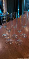 Front group view of five flutes on tabletop