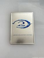 Front of silver steelbook case showing Halo 2 logo