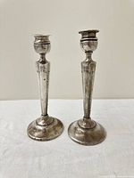Front view of both candlesticks