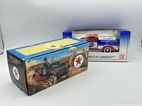 Both boxed trucks side by side