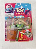 Front view of sealed Toy Story Buzz Lightyear karate chop action figure in blister pack