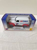 Front of boxed die-cast coin bank