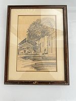 Front view of framed drawing under glass