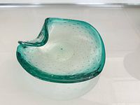 Overall view of teal glass ashtray